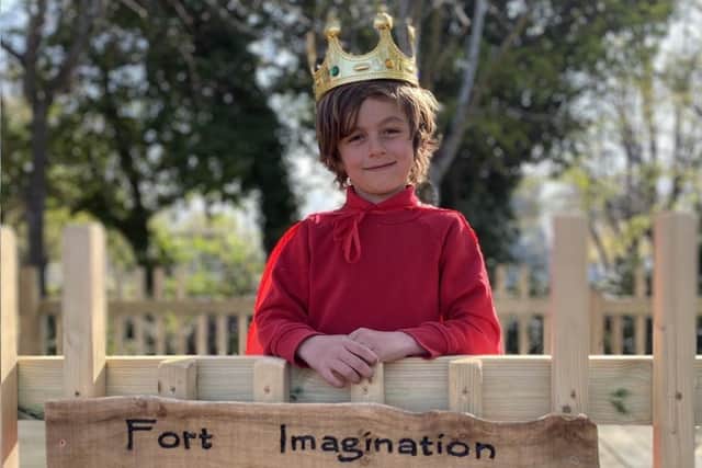 Ezra Osborne, six, offically opens the Elson Infant School new fort.