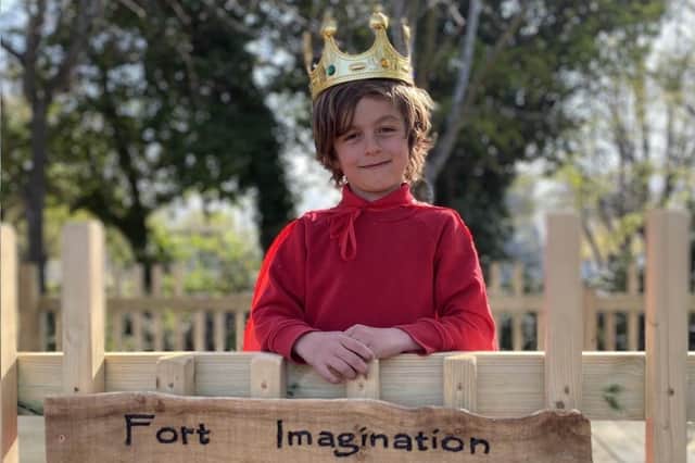 Ezra Osborne, six, offically opens the Elson Infant School new fort.