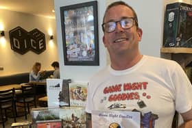 Anthony Noon, from Fareham, with his new book Game Night Goodies at its launch at Dice in Southsea. Picture by Ivan Prothero. 
