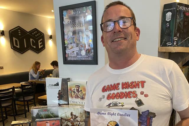 Anthony Noon, from Fareham, with his new book Game Night Goodies at its launch at Dice in Southsea. Picture by Ivan Prothero.