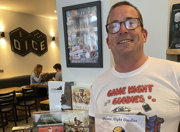 Anthony Noon, from Fareham, with his new book Game Night Goodies at its launch at Dice in Southsea. Picture by Ivan Prothero. 