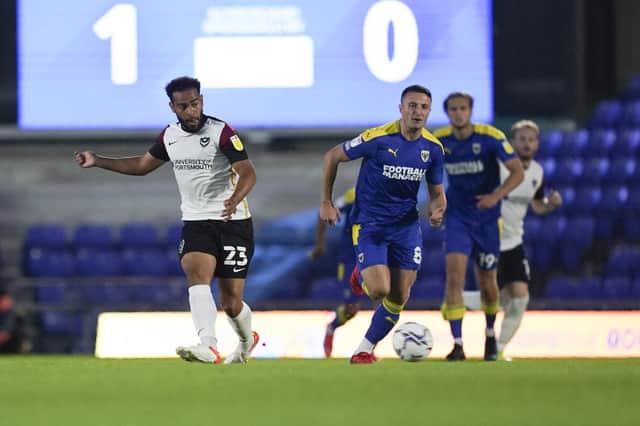 Portsmouth midfielder Louis Thompson passes during the EFL Trophy match between AFC Wimbledon and Portsmouth at Plough Lane   Photography: Jason Brown