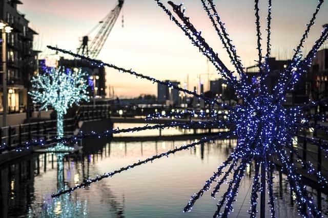 Portsmouth Harbour is decorated with Christmas lights