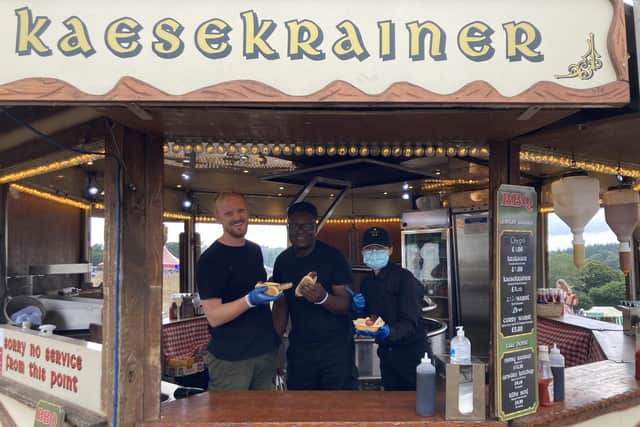 Matt Todd, 26, from Gosport, was selling sausages with his co-workers Juma Sat, 59, and Ze Liu, 30, both from Birmingham, at the Wickham Festival 2021