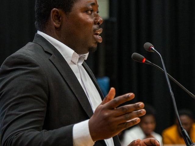 Images from PATECS2025:  The Convener, Anuoluwapo Gabriel addressing the audiences.