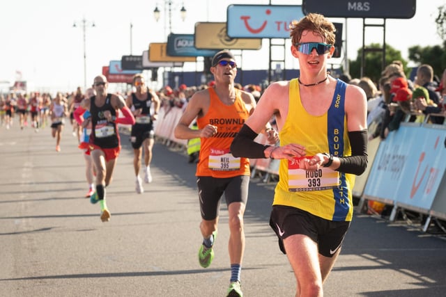 Pictured is: Runners cross the line to finish

Picture: Keith Woodland (151021-564)