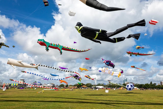 Some of the many airborne characters at the Portsmouth Kite Festival. Picture: Mike Cooter (070821)