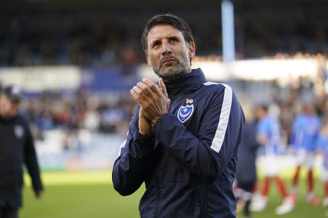 Pompey boss Danny Cowley applauds the Fratton faithful after today's game against Harrow Borough