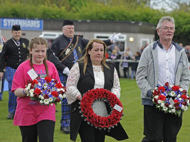 Lee Rigby's sister Amy, eft, mum Lyn, centre, and stepfather Ian all attended the Lee Rigby Memorial Cup match at AFC Portchester in 2017 and will be at the latest memorial match on Friday Picture: Ian Hargreaves