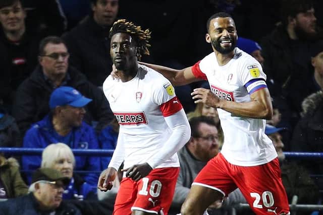Freddie Ladapo, left, celebrates scoring for Rotherham against Pompey. Picture: Joe Pepler