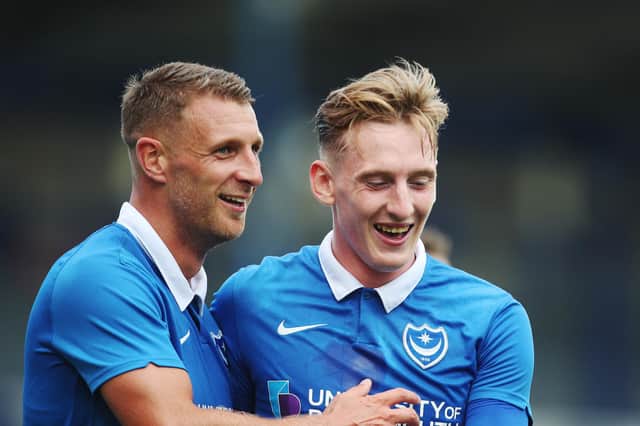 Defender Lee Brown, left, and Ronan Curtis are all smiles in the Peterborough friendly victory. Picture: Joe Pepler