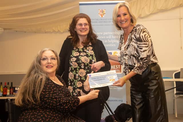 Dame Caroline Dinenage MP presents cheque to Gosport and Fareham Multiple Sclerosis Society chairs Jenny Jessup (left) and Tina Walker. Photos by Alex Shute