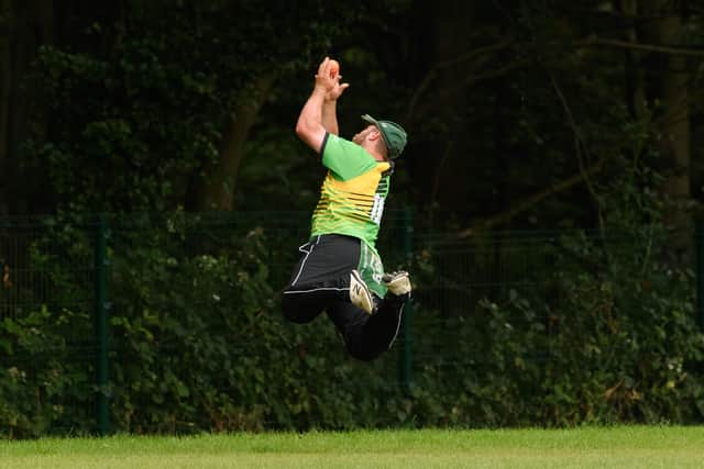 Sarisbury Athletic skipper Josh Hill saves a boundary by deflecting the ball back over the ropes during his side's SPL T20 Plate loss to Portsmouth & Southsea. Picture: Keith Woodland