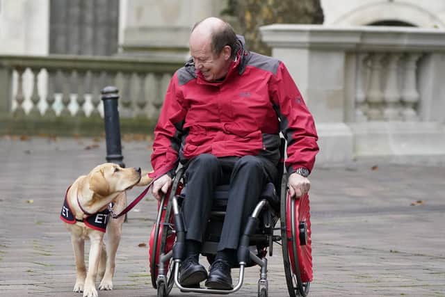 ET and charity founder Allen Parton put their best paw forward.