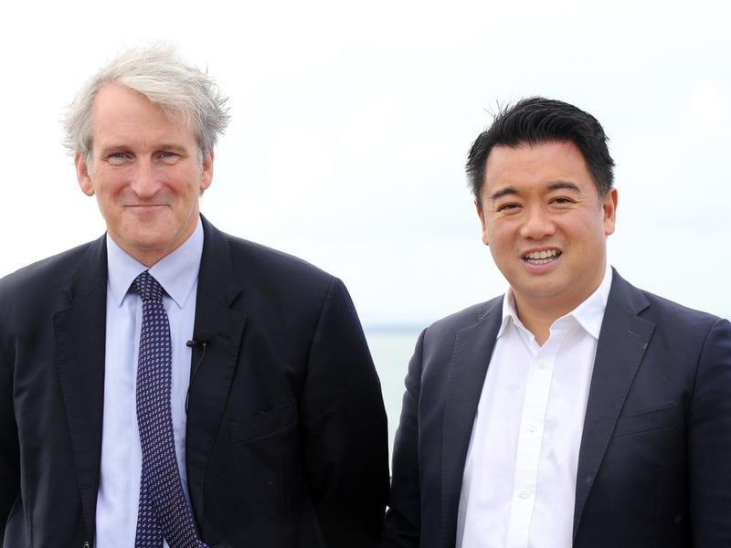 Minister Damian Hinds for prisons, parole and probation, visited a community payback project on Hayling Island on Thursday, September 21, where offenders took part in the Great British Beach Clean to repay their debts to society while also tangibly benefitting the environment and their local communities. Pictured is: (l-r) Minister Damian Hinds for prisons, parole and probation, with Alan Mak MP.Picture: Sarah Standing (210923-1724)