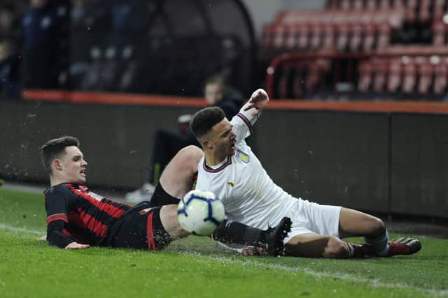 Tom Dinsmore, left, in action for  AFC Bournemouth against Aston Villa in the FA Youth Cup in February 2019. Photo by Alex Burstow/Getty Images.