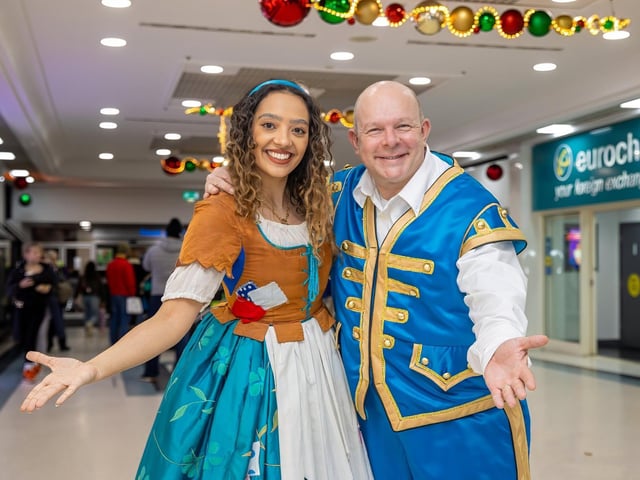 The crowds braved the wind and rain to watch the Christmas lights being switched on in Fareham highstreet on Saturday evening, while some of the entertainment was moved into the shopping centre.Pictured - Rhiannon Bacchus (Cinderella) & Paul Burling (Buttons) from the Fareham Live pantomime of CinderellaPhotos by Alex Shute