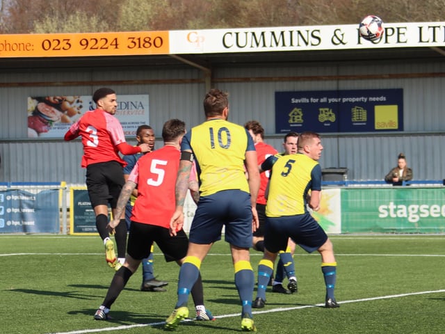 Fareham's Casey Bartlett-Scott, left, gets in a header. Picture by Ken Walker