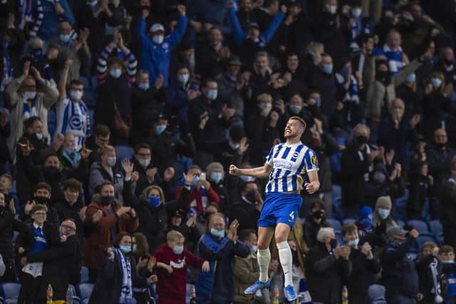 Adam Webster celebrates his goal against Manchester City. (Photo by Justin Setterfield/Getty Images)