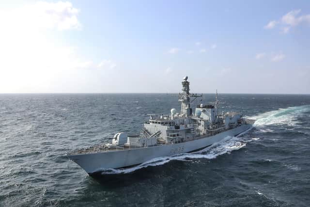 Pictured: HMS MONTROSE carrying out duties, protecting British shipping in the Gulf.