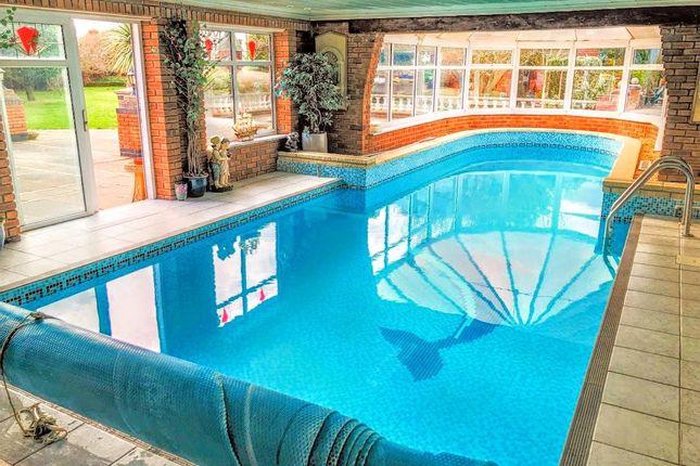 This elegant pool is at a five-bedroom detached which also boasts a sauna, solarium and snooker room with a bar. Price: £695,000