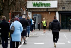 Waitrose is cutting the price of over 200 of their products. Picture: ADRIAN DENNIS/AFP via Getty Images.