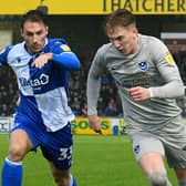 Pompey's Ronan Curtis battles for possession with Alex Rodman of Bristol Rovers. Picture: Graham Hunt