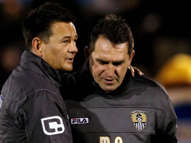 Paul Doswell, then the Sutton boss, with Notts County counterpart Martin Allen prior to the FA Cup second round tie in December 2011. The Magpies won 2-0.Photo by Scott Heavey/Getty Images.
