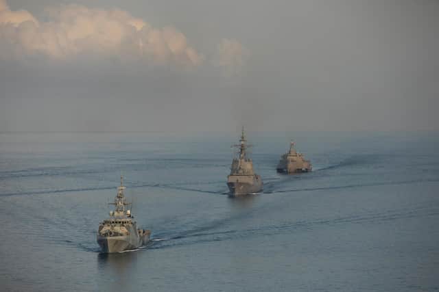 Participating ships of Exercise KAKADU 2022 sail in formation during the Photo Exercise off the coast of Darwin.