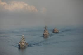 Participating ships of Exercise KAKADU 2022 sail in formation during the Photo Exercise off the coast of Darwin.