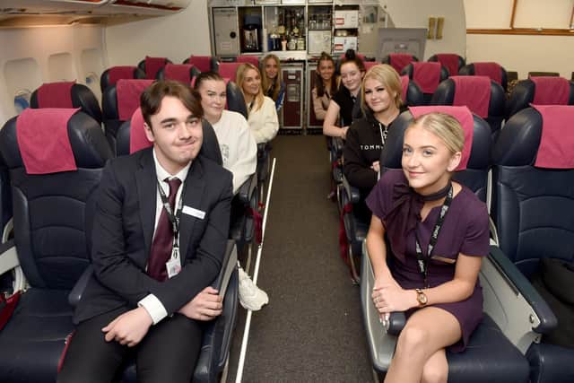 Havant and South Downs College has built its own aviation suite for their air cabin crew training course. Pictured is: (front row left to right) Charlie Zammit and Tegan Wheeler, (second row left to right) Caitlin Reed and Emily Hogan, (third row left to right) Laila Baines and Tia Roy, and (fourth row left to right) Jazmine Bryden and Scarlett Lea. Picture: Sarah Standing (290922-3992)
