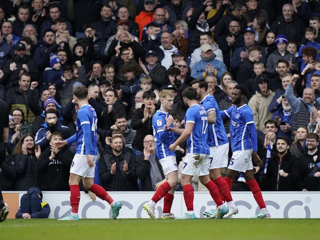 The Pompey fans look happy after Paddy Lane opened the scoring against Reading on 36 minutes
