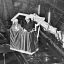Prince Charles with Dr Margaret Rule checking progress on the Mary Rose in 1986. Picture: The News img1875
