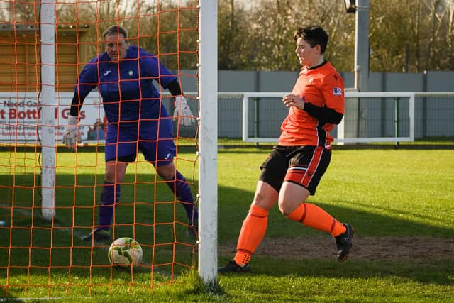AFC Portchester tap home one of their 10 goals against Bedhampton.
Picture: Keith Woodland