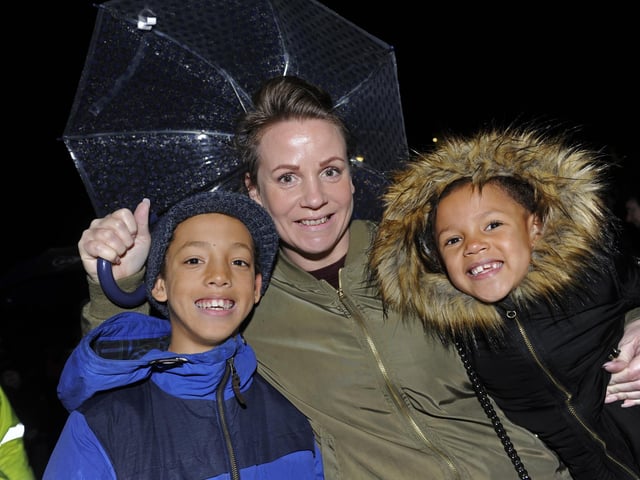 Hundreds of people saw the Christmas lights switch on at Commercial Road, Portsmouth in 2016. (left to right), Lemar Adekoya (11), mum Angela Welch and sister Shadae (six). Picture Ian Hargreaves (161295-3)