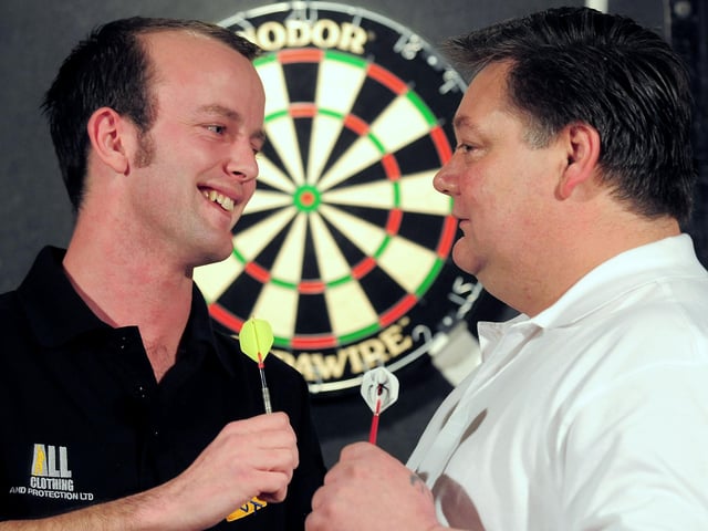 Mike Symes goes head to head with opposite number Troy Butler at the 2009 Gosport Pub League v Gosport Club League charity match.