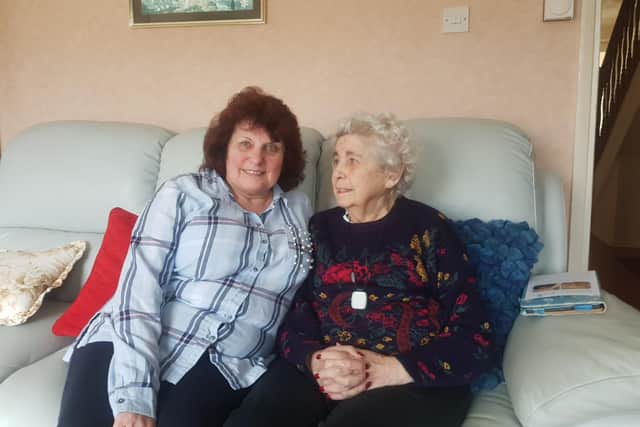 Volunteer befriender Aileen Doidge, left, has been paired up with this older resident through Gosport Voluntary Action's befriending service. This picture was taken before social distancing rules were brought in.