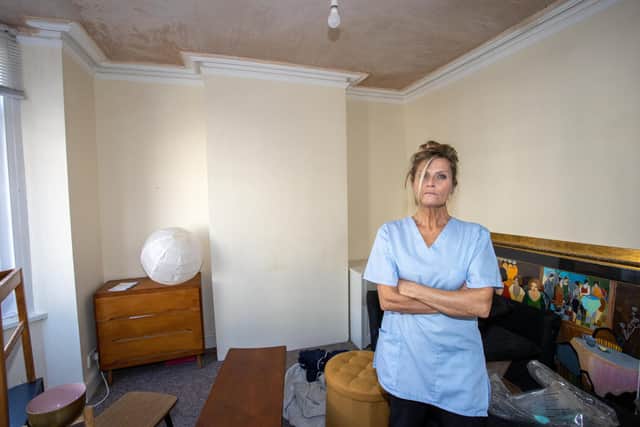 Suzanne Jasicki was left dazed after her living room ceiling came crashing down on her, despite repeated reports to her letting agent Belvoir that it was unsafe. Photos by Alex Shute