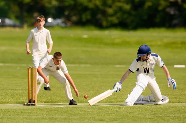 A Portsmouth Community player makes it home against Fareham & Crofton 3rds. Picture: Keith Woodland (270521-187)