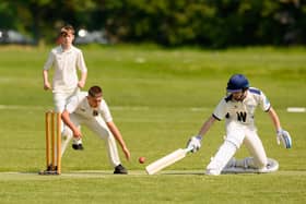 A Portsmouth Community player makes it home against Fareham & Crofton 3rds. Picture: Keith Woodland (270521-187)