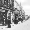 Palmerston Road. Most of what you see in this photo was swept away during World War Two, but in the top left hand corner can be seen the steeple of St Jude's Church in Kent Road. This is a view from Osbourne Road, looking north up Palmerston Road, Southsea with Handley's store to the left of the photograph.