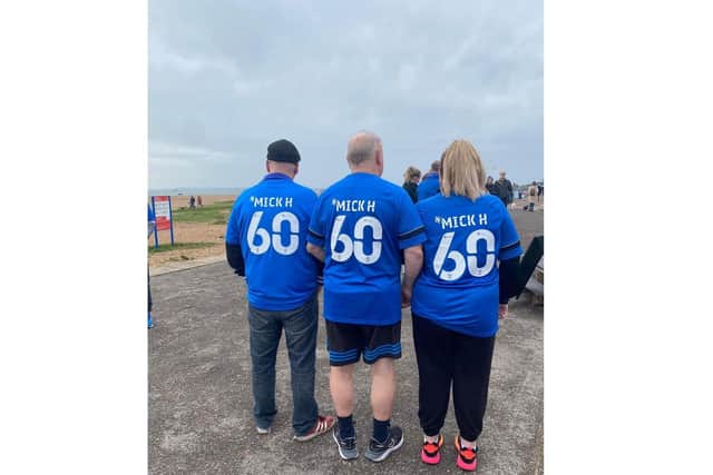 Family and friends of Mick Hansford from Portsmouth who died from a brain tumour in 2021 walked a sponsored 10km walk on New Year's Day - on what would have been his 60th birthday 