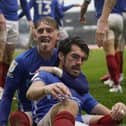 Ronan Curtis celebrates with John Marquis following his second goal against Sunderland.  Picture: Jason Brown.