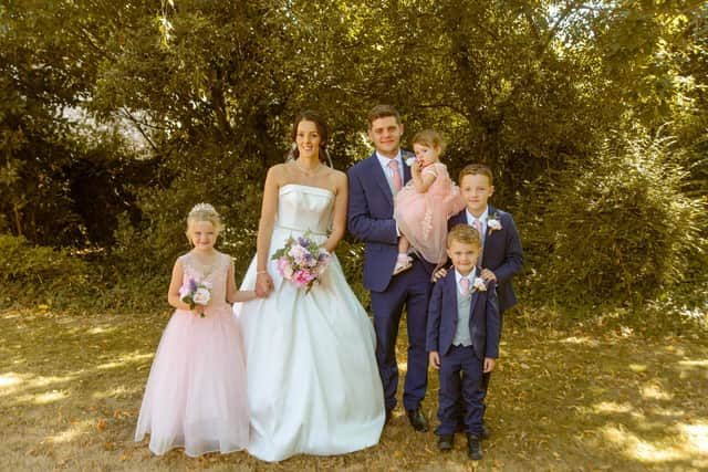 Bride, groom and kids. Picture: Tegan McCann