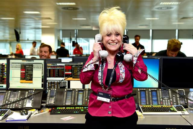 Barbara Windsor on the trading floor during the BGC Partners Charity Day in London's Docklands. Picture: Ian West/PA Wire