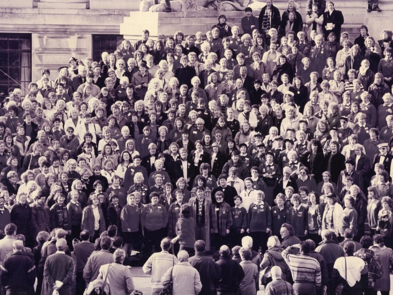Singers on the steps of Portsmouth Guildhall for the mass sing-in at the close of the Ladies Association of Barbershop Singers convention in November 1993. The News PP5503