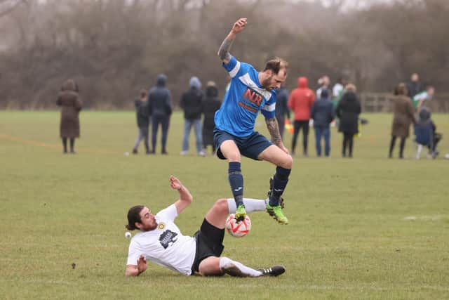 Bransbury (blue) v Pompey Chimes. Picture  by Kevin Shipp