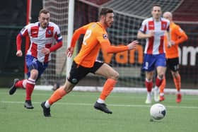 Action from Hawks' last National League South game of 2019/20, a 2-1 win at Dorking on March 14 - the Surrey club's fifth successive league defeat. Pic: Kieron Louloudis