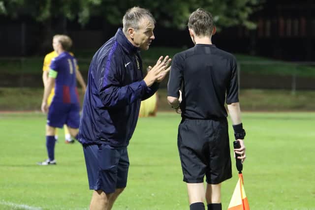 US Portsmouth manager Fraser Quirke has a word with a linesman last night. Picture by Ken Walker