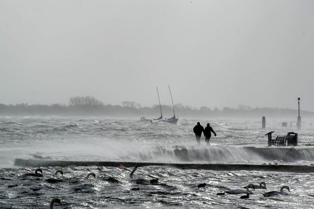 Storm Eunice was the first major storm to hit Portsmouth since Storm Barra in December 2021.

Pictured: A couple walking along Emsworth Harbour Walk

Picture: Habibur Rahman